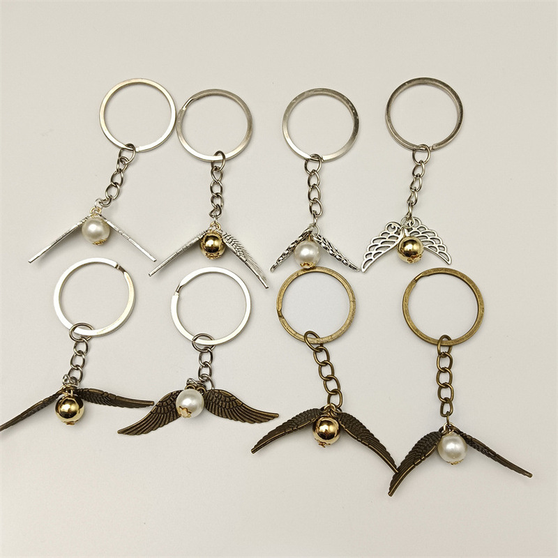 European and American Retro Harry Potter Movie Golden Snitch Ball Big Wings Keychain Pendant Jewelry Accessories Supply