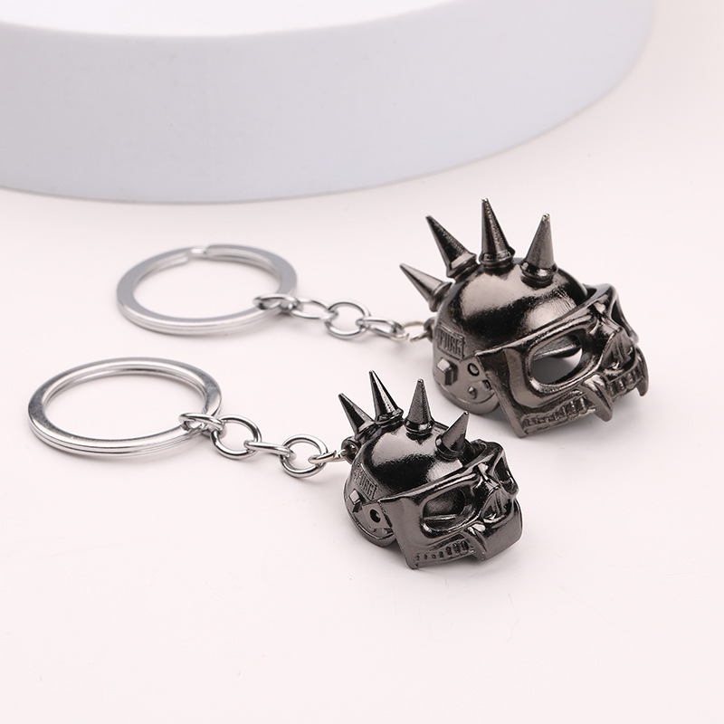 Factory direct cross-border selling skull keychain eating chicken game helmet keychain pendant large quantity excellent price Factory direct cross-border selling skull keychain eating chicken game helmet keychain pendant large quantity excellent price