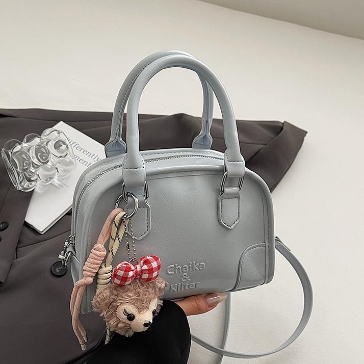 Bolso de béisbol de mano popular de este año para mujer 2025 nuevo bolso de hombro casual de todo fósforo bolso de mensajero de moda de alta gama