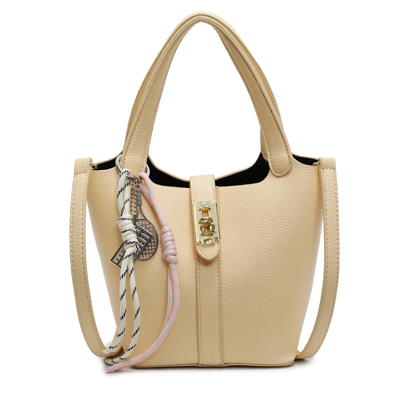 Este año, la popularidad de la bolsa de cubo para mujeres de alta calidad, el nuevo tipo 2025 de moda universal, bolso de transporte, bolso de moda extranjero