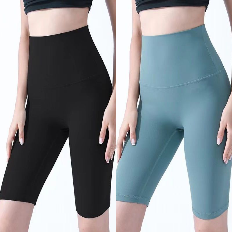 Pantalones cortos desnudos de mujer elásticos apretados para elevar las caderas de cinco puntos pantalones deportivos de secado rápido succión de sudor entrenamiento para correr fábrica de comercio de ping