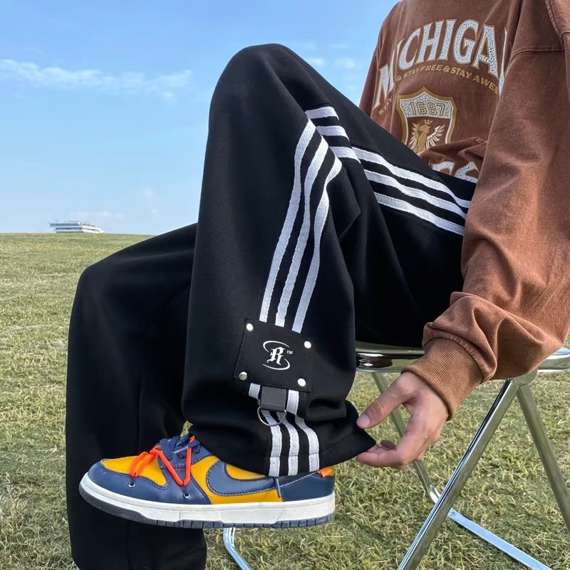 Pants men's autumn 2022 new design sense niche casual pants versatile striped loose straight sports trousers Pants men's autumn 2022 new design sense niche casual pants versatile striped loose straight sports trousers