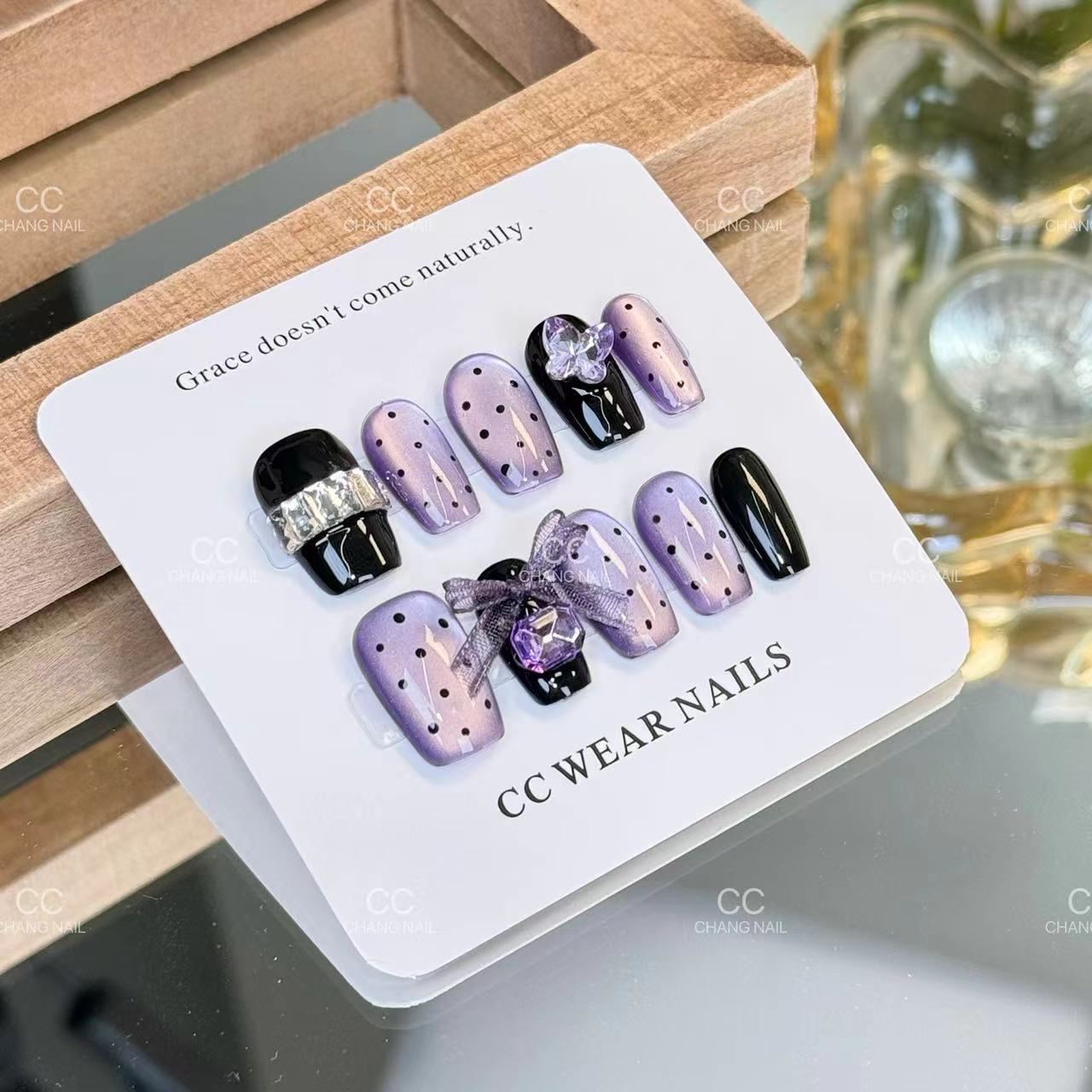 Armadura portátil hecha a mano corta carillón de viento morado vidrio púrpura ojo de gato de alta calidad con punto de onda blanca, pieza de uña extraíble