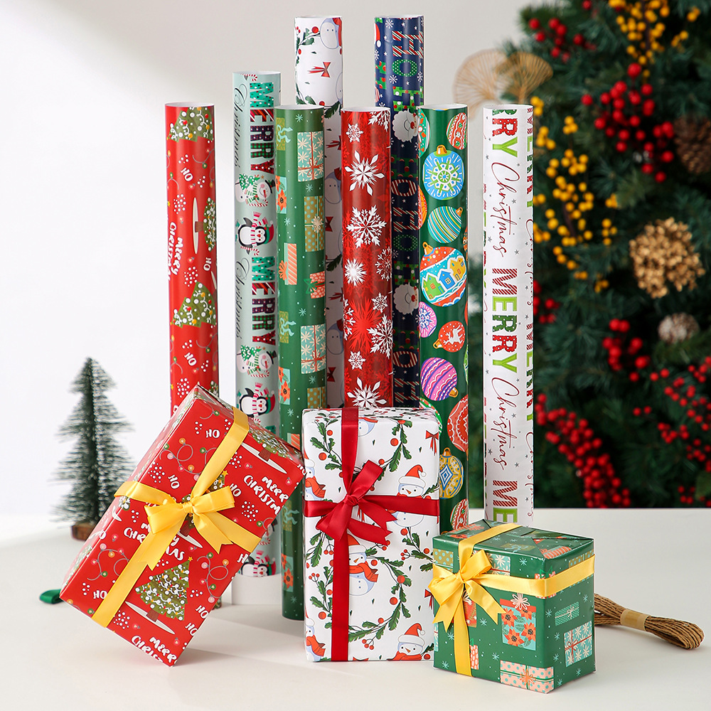 Nuevo papel de embalaje de papel de bronce de Navidad Papá Noel dibujos animados copo de nieve alce impresión de regalo embalaje de regalo