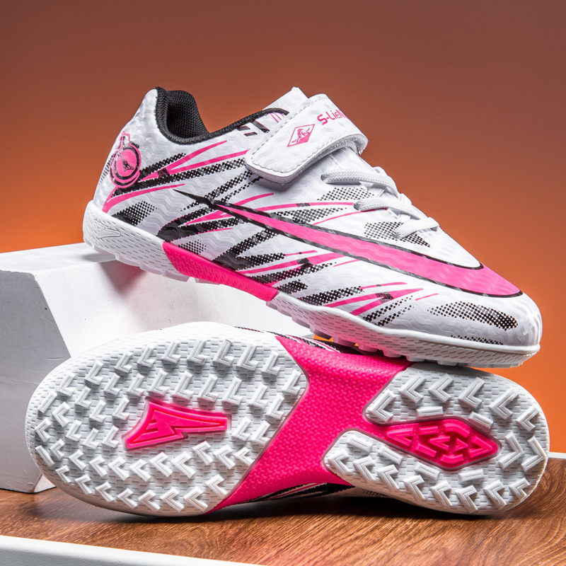 Zapatos de fútbol transfronterizos de alto perfil para hombres TF zapatos de entrenamiento antideslizante transpirables para niños zapatos deportivos profesionales para estudiantes