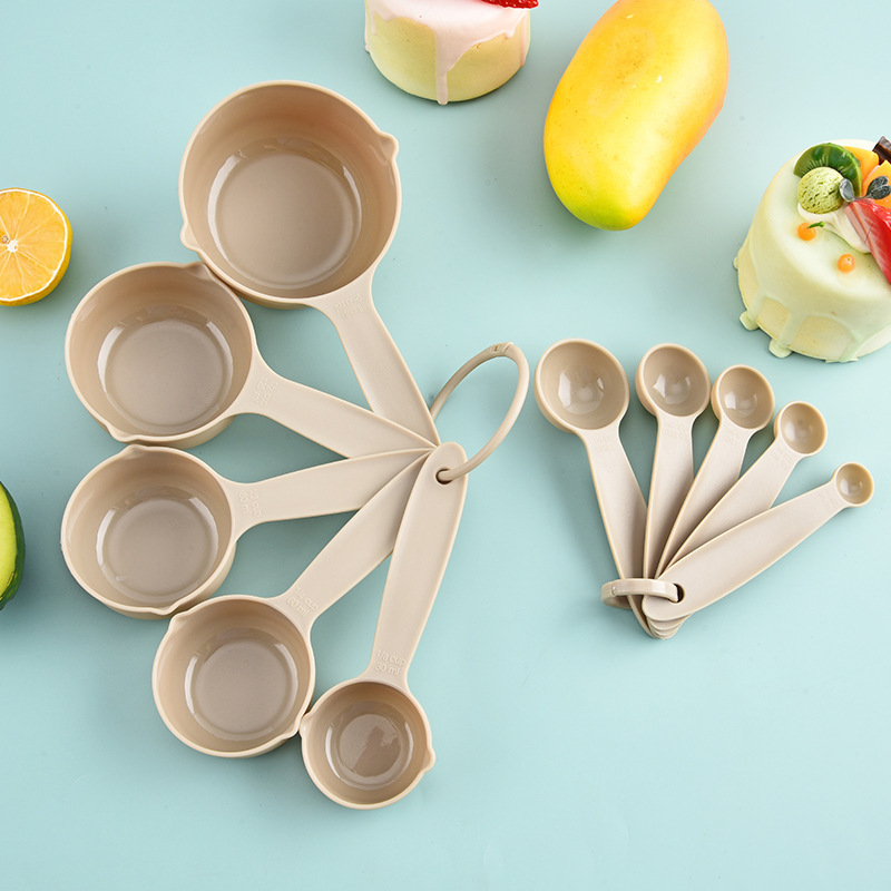 21 piezas de conjunto de cocina transfronteriza de cocina batida de huevos raspadora cucharada de medición taza de medición a prueba de caliente pinza de aceite cepillo de fugas pala