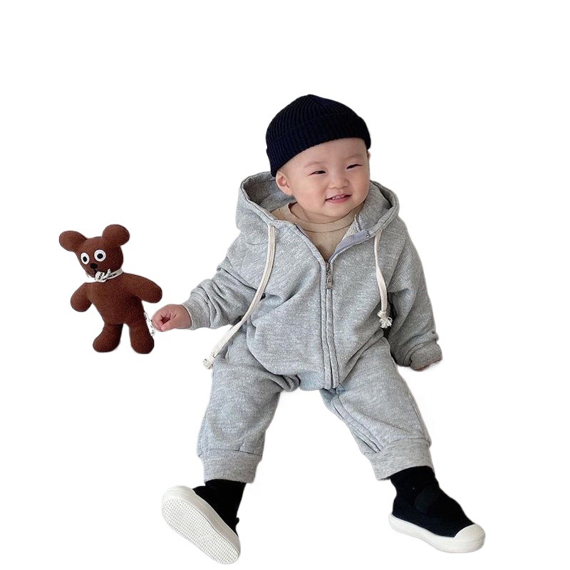Ins Otoño e Invierno estilo coreano bebé estilo occidental cremallera con capucha de algodón de manga larga mono suéter de los hombres y mujeres bolsa de bebé pedo mameluco