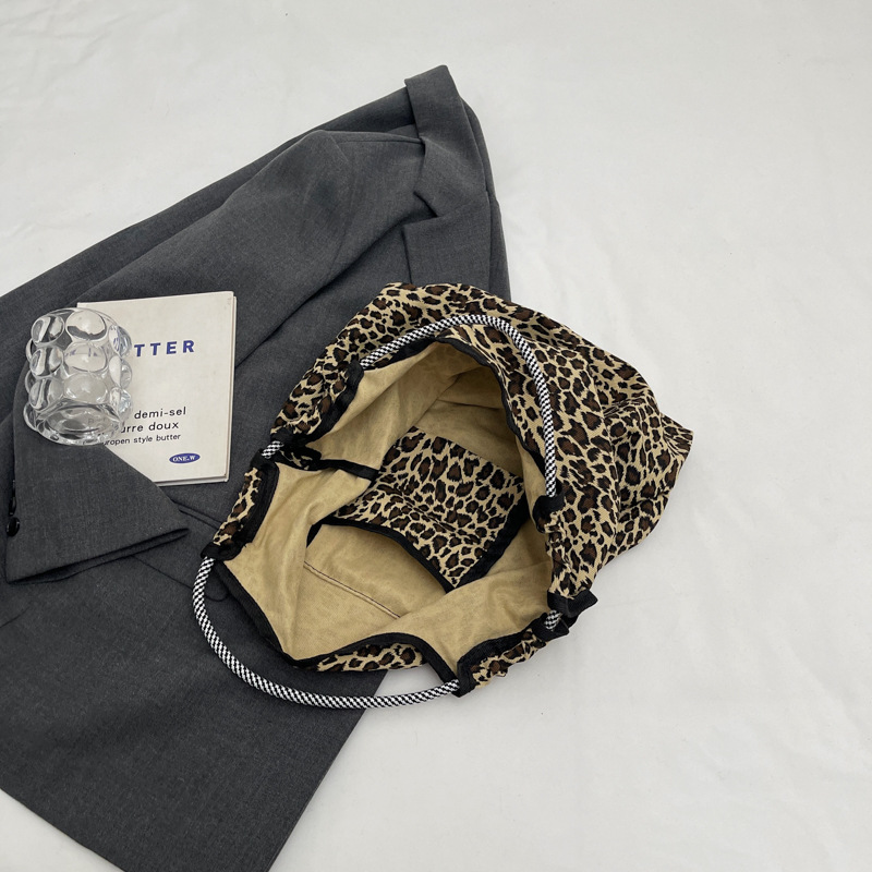 Versión coreana del bolso de tela con estampado de leopardo súper fuego, bolso de hombro de gran capacidad para mujer, bolso de compras, bolso portátil de moda
