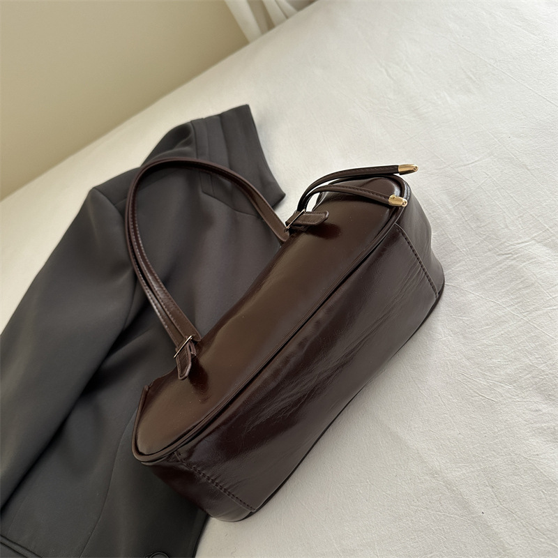 Borsa baguette a spalla elegante e testurizzata per donna_voghion.com