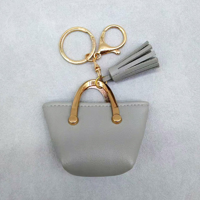 Llavero para mujer, bolso, colgante, joyería, mini monedero de almacenamiento de cuero lindo europeo y americano