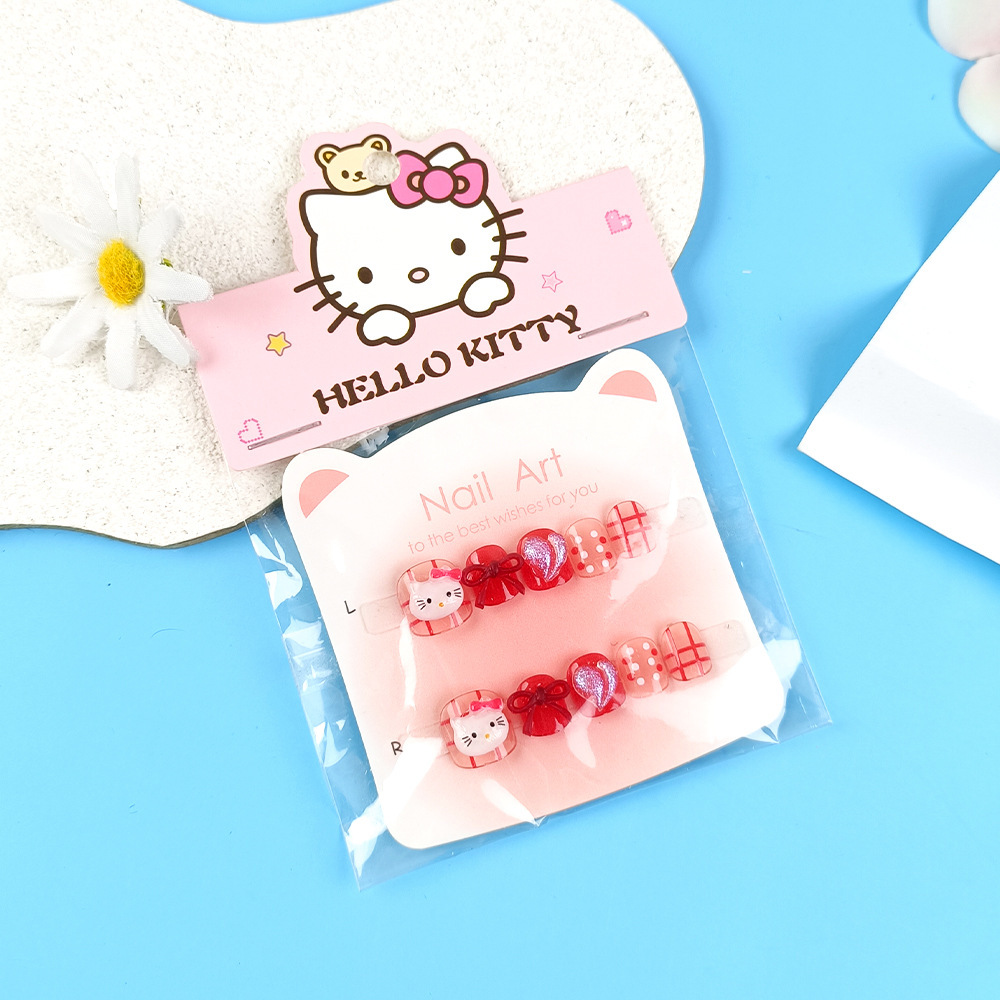 Punto de perforación diez piezas de papel de cartón de manicura gato arco de mariposa niños que usan uñas dibujos animados adorables parches de uñas para niños