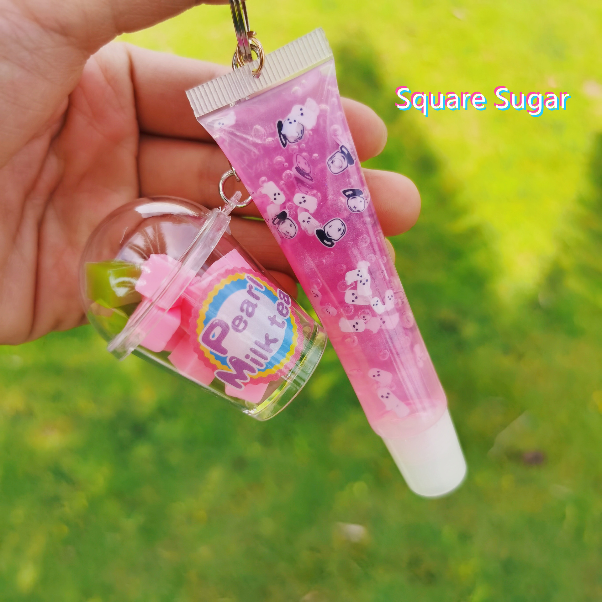 Shangxin niños cosméticos mecedora música llavero colgante tropical fruta niños piel bola colgante labio esmalte no lo