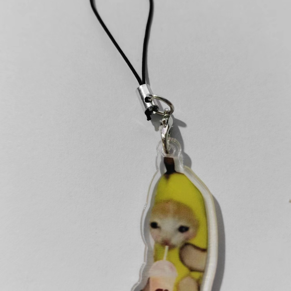 Comida Cabeza de gato Plátano Gato Emoji Llavero Red de Internet Escultura de arena Spoof Cat Little Red Book Estilo explosivo Colgante de mochila escolar