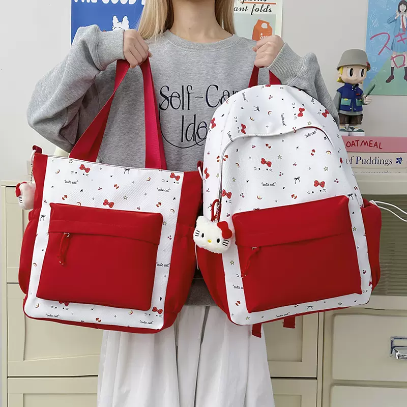 日系学院风书包卡通kt猫轻便大容量初高中生补课袋休闲百搭双肩包