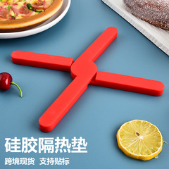 国境を越えた現物の食事マットの台所の土鍋の防熱マットの家庭用高温に強い十字シリカゲルの断熱マット