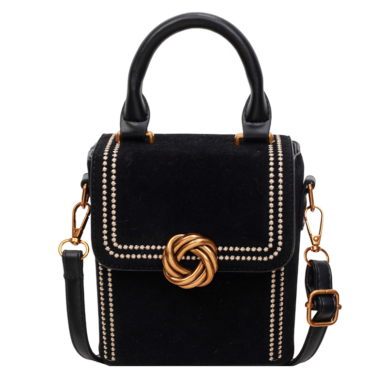 Retro alta sensación vertical bolso de mano pequeña mujer otoño / invierno 2025 nuevo estilo de moda bolso de hombro simple bolso de mochila
