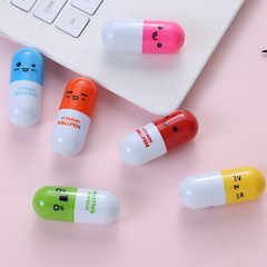 新しいミニスマイリーフェイス表現ピルペンクリエイティブ伸縮カプセルペンパズル学生文具ギフト在庫卸売