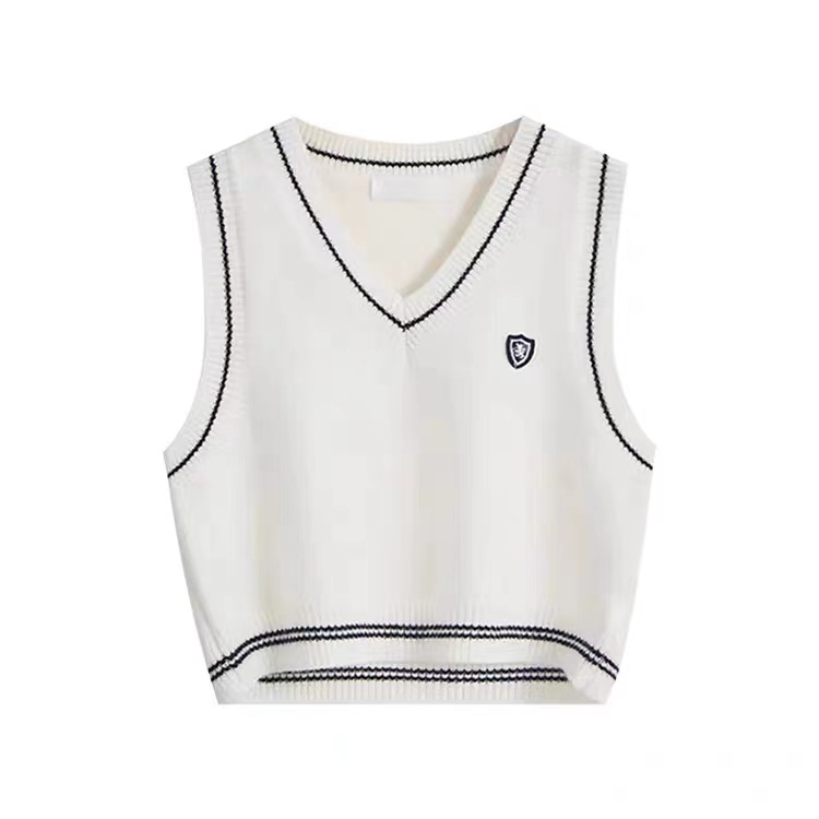 Chaleco exterior corto blanco Chaleco de adelgazamiento pequeño de estilo occidental con cuello en V chaleco apilado superior primavera