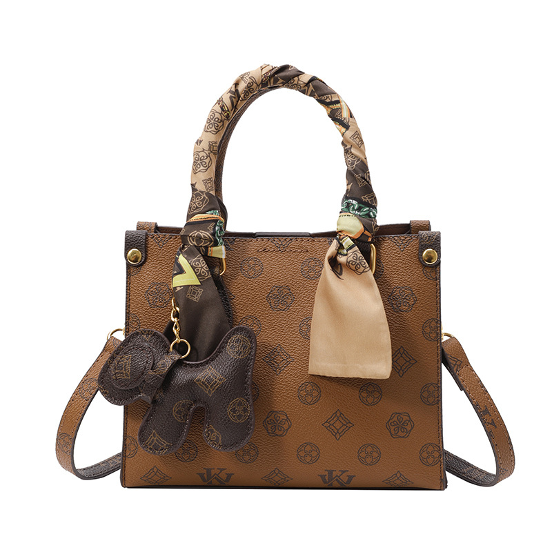 Bolso de impresión retro 2024 invierno nuevo bolso de tendencia temperamento de moda versátil hombro alto sentido ligero bolso de lujo de mujer