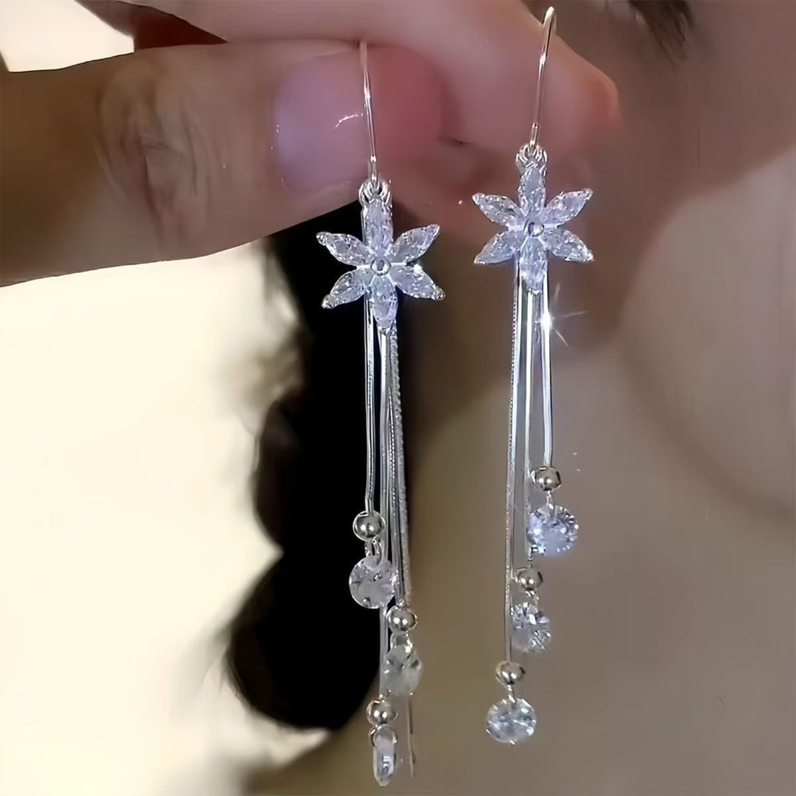 Super Shiny Rhinestone Flower Tassel Earrings 2026 New Hot Style High-End Long Versatile Earrings Suitable for Round Faces