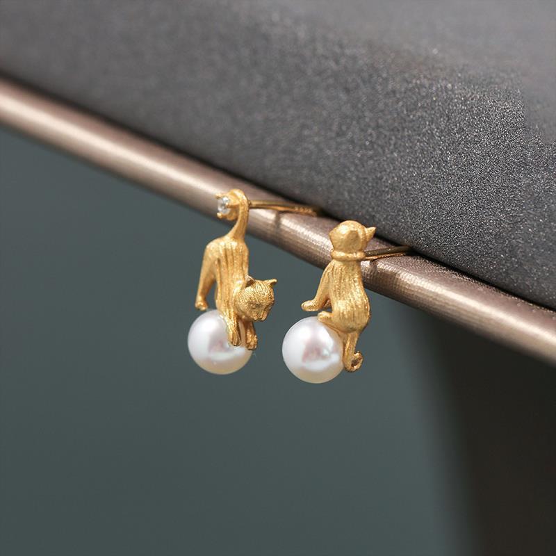 Japanese design cute asymmetrical earrings from pearl