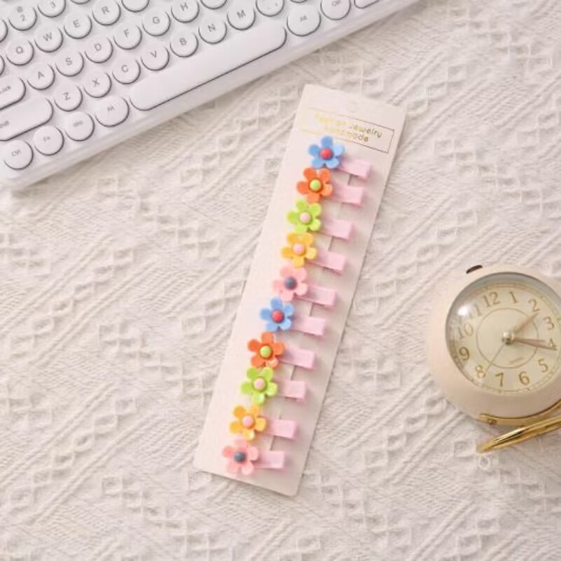 La horquilla del bebé de los niños no duele el cabello clip de pico de pato lado de la niña horquilla rota coreano lindo flequillo clip al por mayor