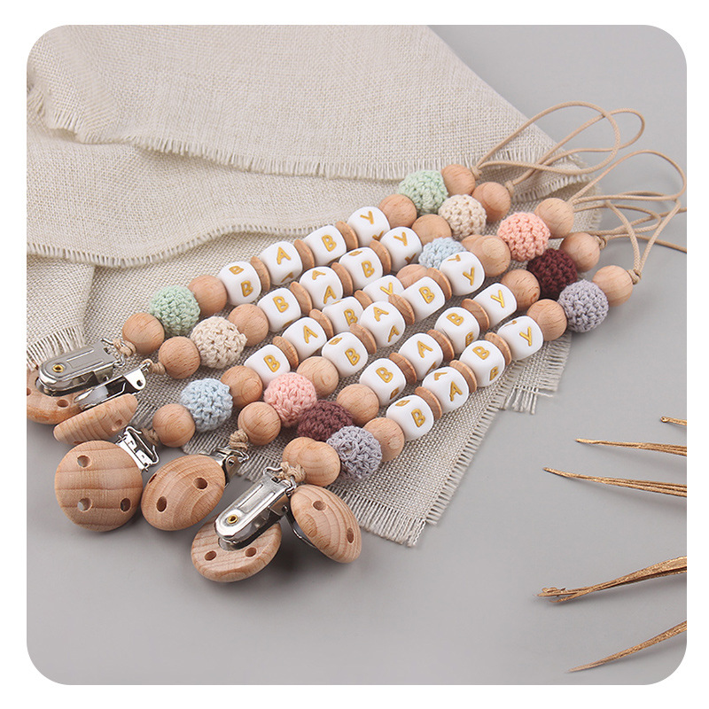 Productos para niños pequeños abrazadera de tetina de beech nombre de bebé DIY creativo de silicona bola de lana calmante tetina cadena anti-caída cadena