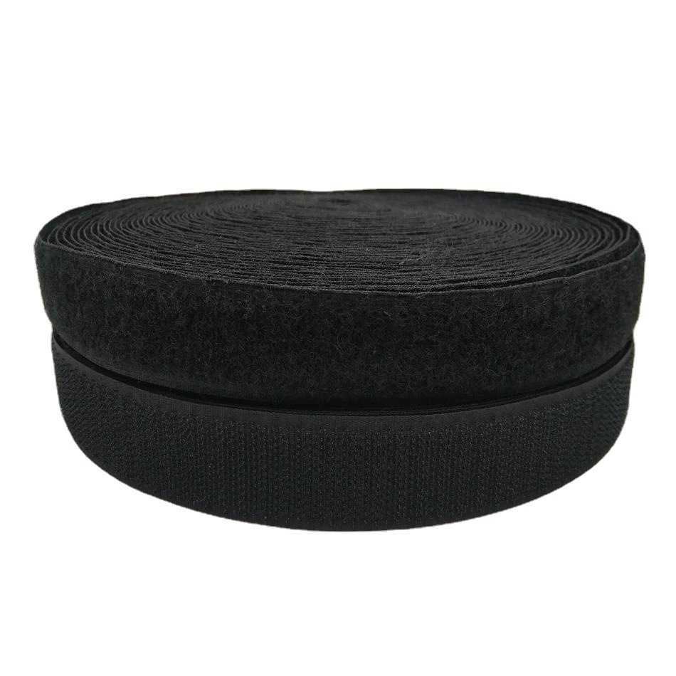 Cierres de gancho y bucle de nailon y poliéster en blanco y negro en stock para bolsos, accesorios de ropa y pantallas.
