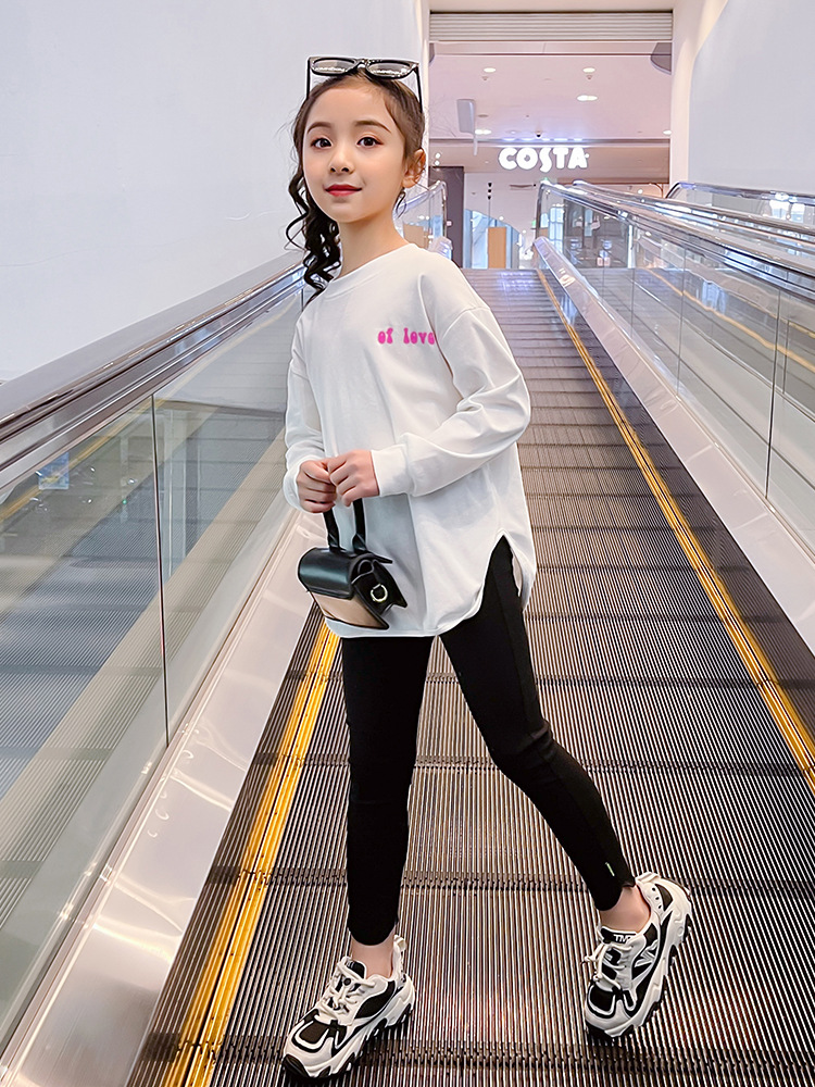 Polainas de las niñas de primavera y otoño nuevas niñas medias y grandes niños pantalones de todo fósforo ropa exterior de moda Pantalones de los niños de moda