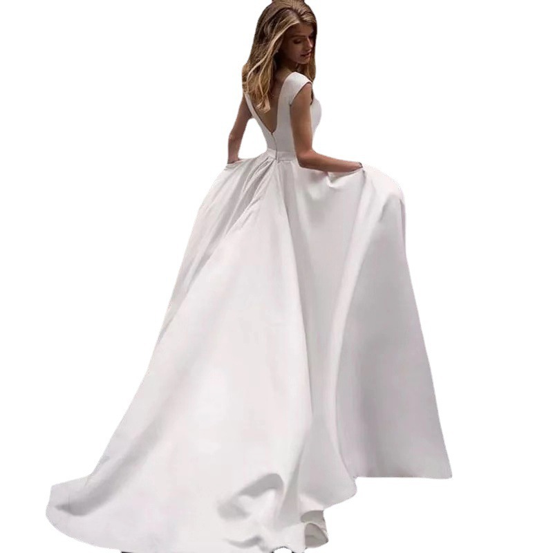 Europa y los Estados Unidos comercio exterior vestido de boda verano 2026 nueva novia de cola sexy delgada satén simple moda de viaje