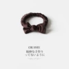 Brown hair rope with bow
