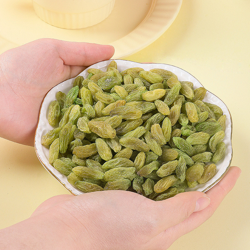 Xinjiang raisins bulk whole box specialty green raisins 500g ready-to-eat dried fruit preserves commercial snacks wholesale