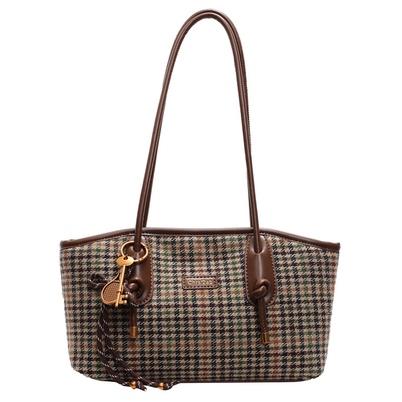 Coreano 1000 pájaros estilo extranjero hombro brazo bolso de viaje de gran capacidad para mujeres 2025 nuevo bolso de moda