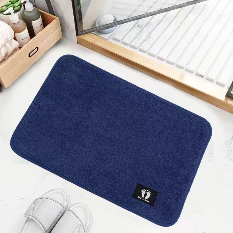 Toalla de suelo antideslizante de lana de coral al por mayor 40*60 casa de familia baño baño alfombra de baño toalla de suelo de comercio exterior absorbente personalizado