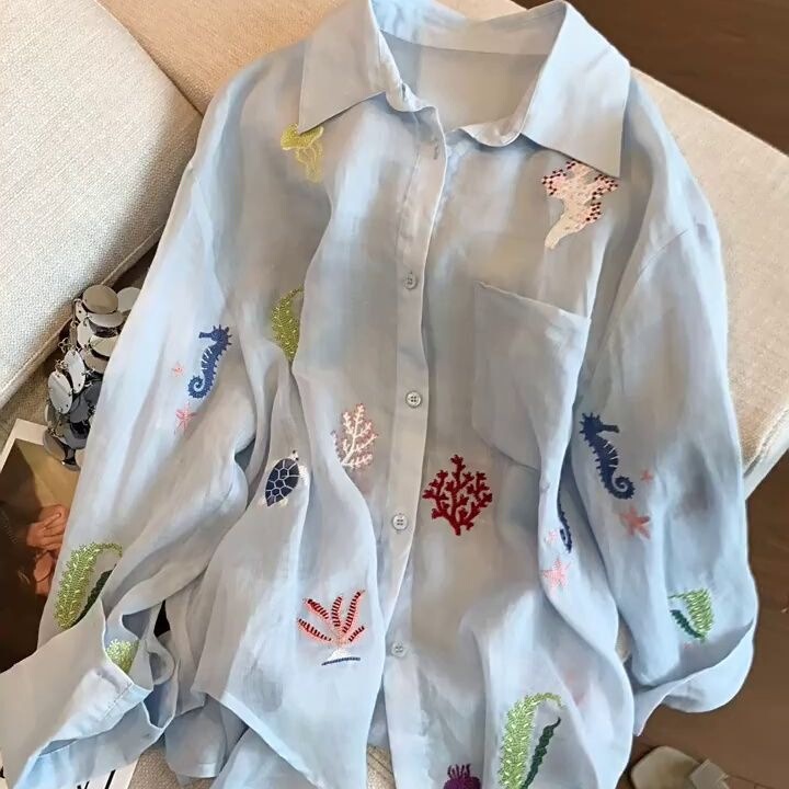 Light Blue Cartoon Embroidered Chiffon Long-Sleeved Shirt for Women 2026 Summer Design Niche Versatile Sun Protection Shirt Light Blue Cartoon Embroidered Chiffon Long-Sleeved Shirt for Women 2026 Summer Design Niche Versatile Sun Protection Shirt