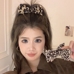 高馬尾ヘアピン高級感豹紋蝶結び団子頭掴み網紅新作気質ファッション髪飾り
