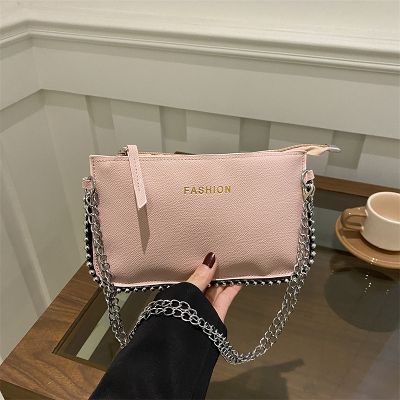 Casual coreano simple mochila personalidad bolso pequeño para mujeres 2025 primavera nueva moda perlas simple bolso de hombro