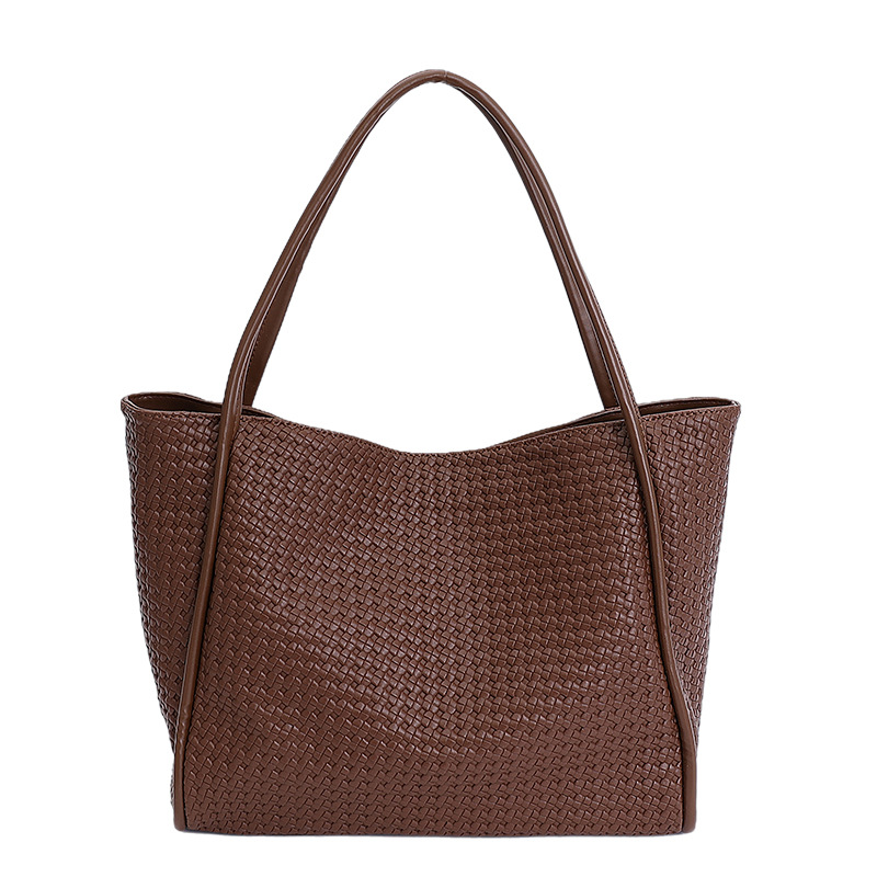Bajo las axilas de gran capacidad para trabajar bolsas de viaje para mujeres nuevas moda coreana alta sensación de amplio ocio bolsas de hombro