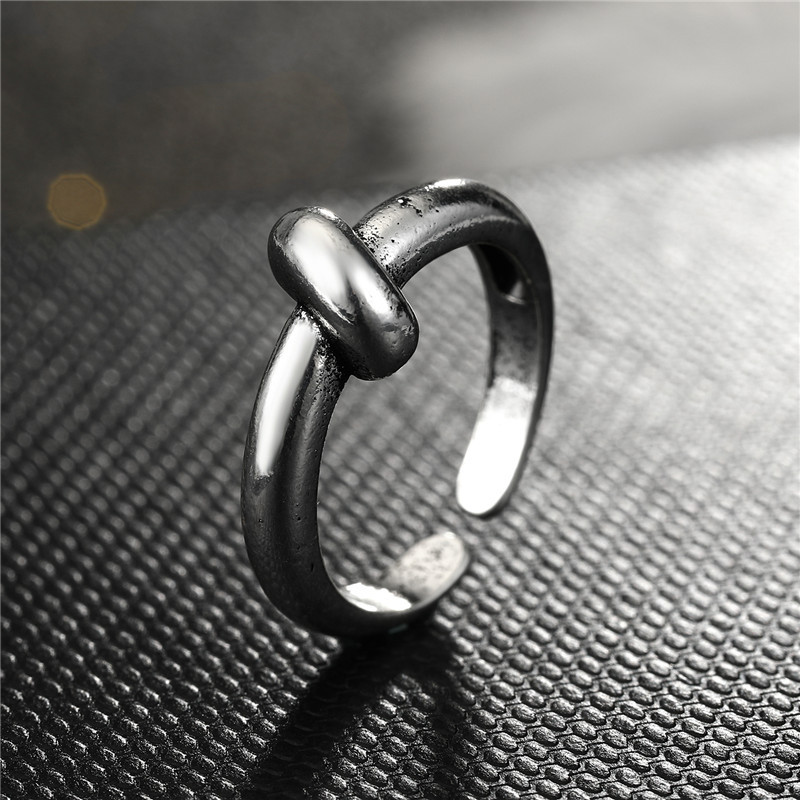 Fashion Geometric Bow Smooth Hollow Metal Ring display picture 10