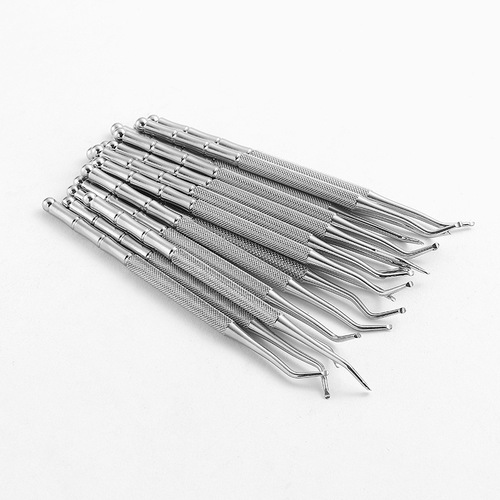 Manufacturer's dual-headed kick-up tool, embedded nail file, nail pick, groove scoop, toe nail cleaner, nail art tool