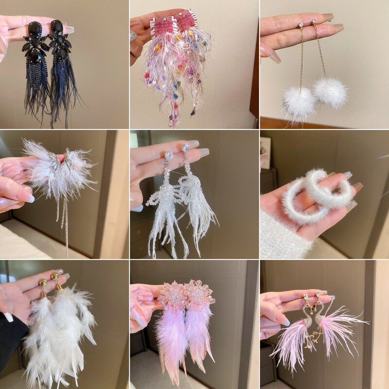 Silver needle super fairy feather bride earrings autumn and winter new fashion earrings high sense light luxury niche earrings women wholesale