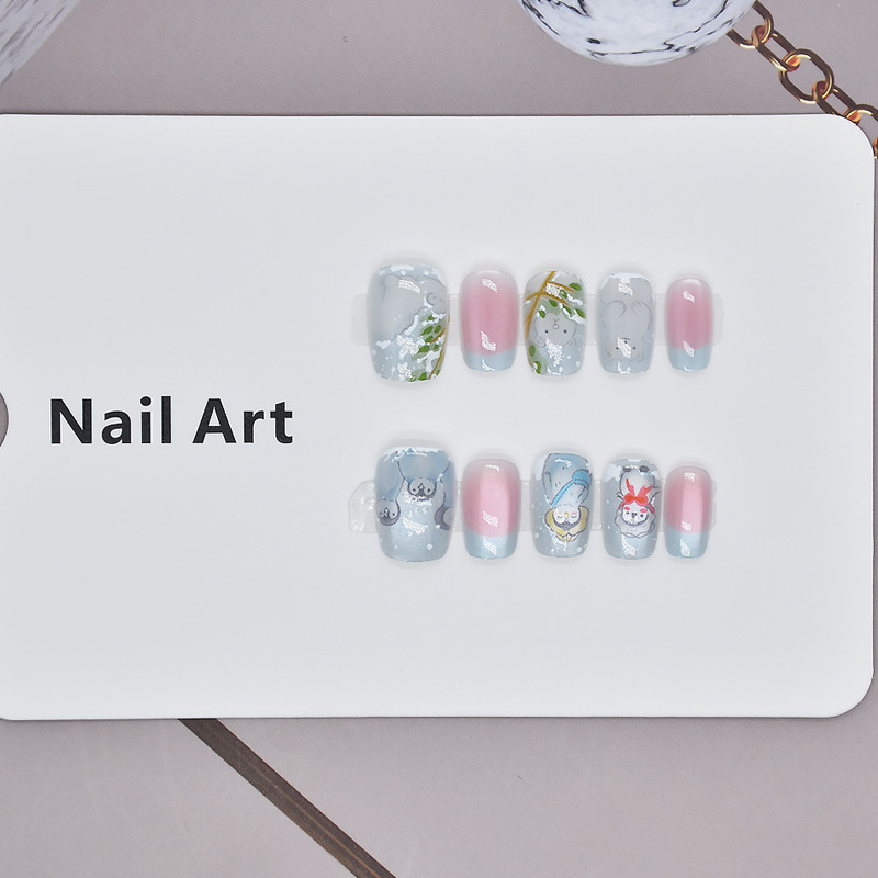 Cartoon para niños que usan uñas de hielo y nieve de verano nuevos productos de cristal ojos de gato hielo azul uñas falsas productos terminados cortos