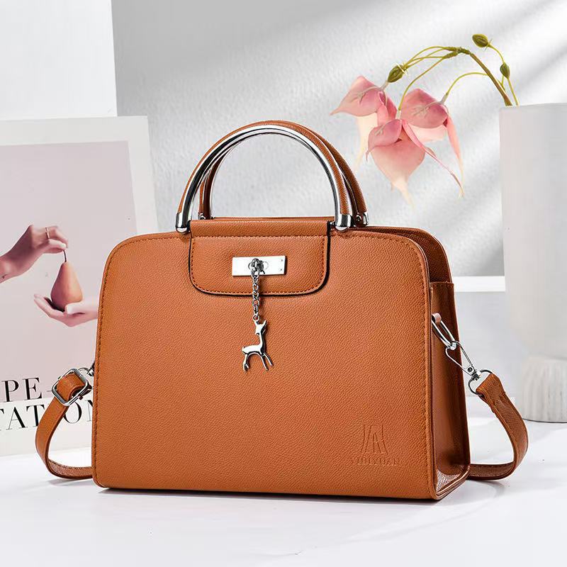 Nuevos ciervos colgantes bolsos de mano bolsos de hombro de moda casual diarios versátiles bolsos de transporte transfronterizos