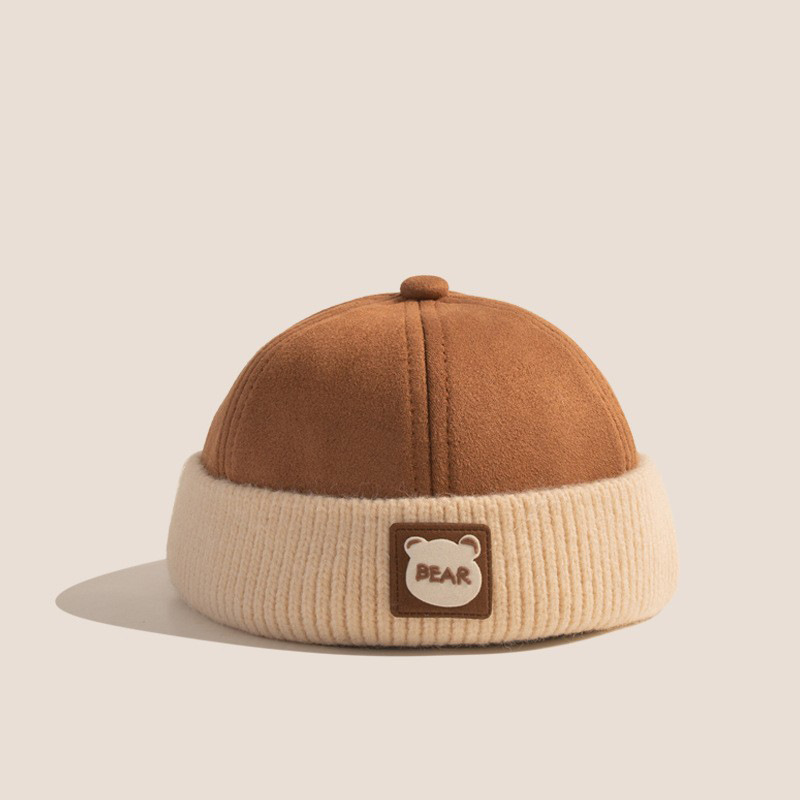 Otoño y invierno coreano estilo exterior sin bordes de color engrosado sombrero de niños para hombres y mujeres bebés caliente sombrero de piel de melón de moda universal