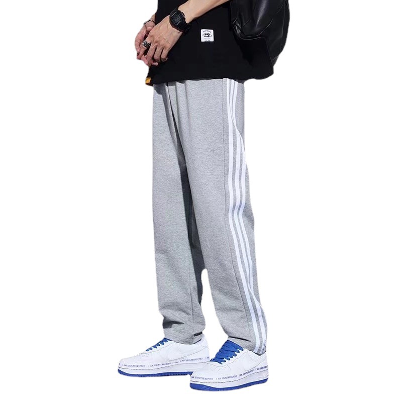 Pantalones de rayas japonesas primavera y otoño de los hombres de moda ins Pantalones deportivos rectos sueltos estilo coreano de moda Pantalones casuales a juego