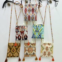 新疆艾德莱斯花纹个性手机包包民族风特色印花单肩手拎斜挎包针织
