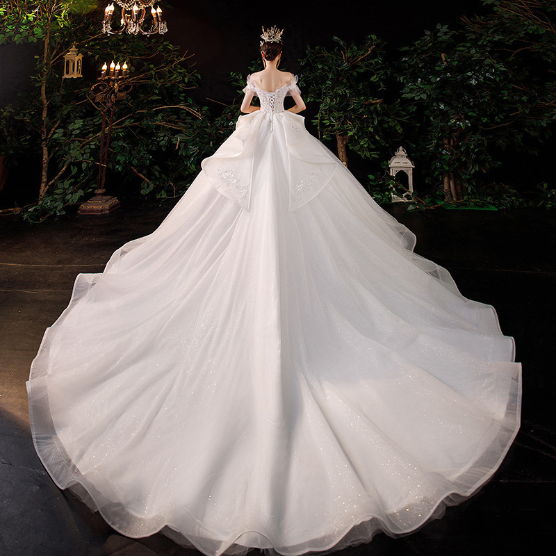 Vestido de novia estilo francés, nueva colección primavera 2026 para novias, vestido principal de hombros descubiertos, estilo princesa de palacio con cola larga, vestido de tul ligero. image 8