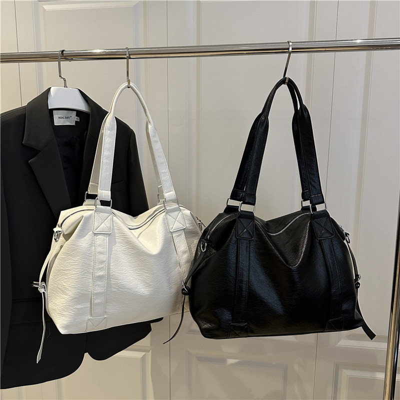 夏季新款2025个性女士单肩斜挎包休闲简约质感时尚大容量托特包