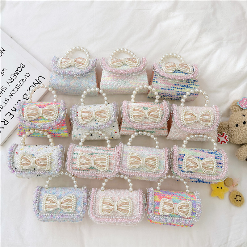 Colorido lentejuelas de los niños bolsa arco accesorios princesa estilo occidental perla bolso coreano mini cadena mensajero bolsa