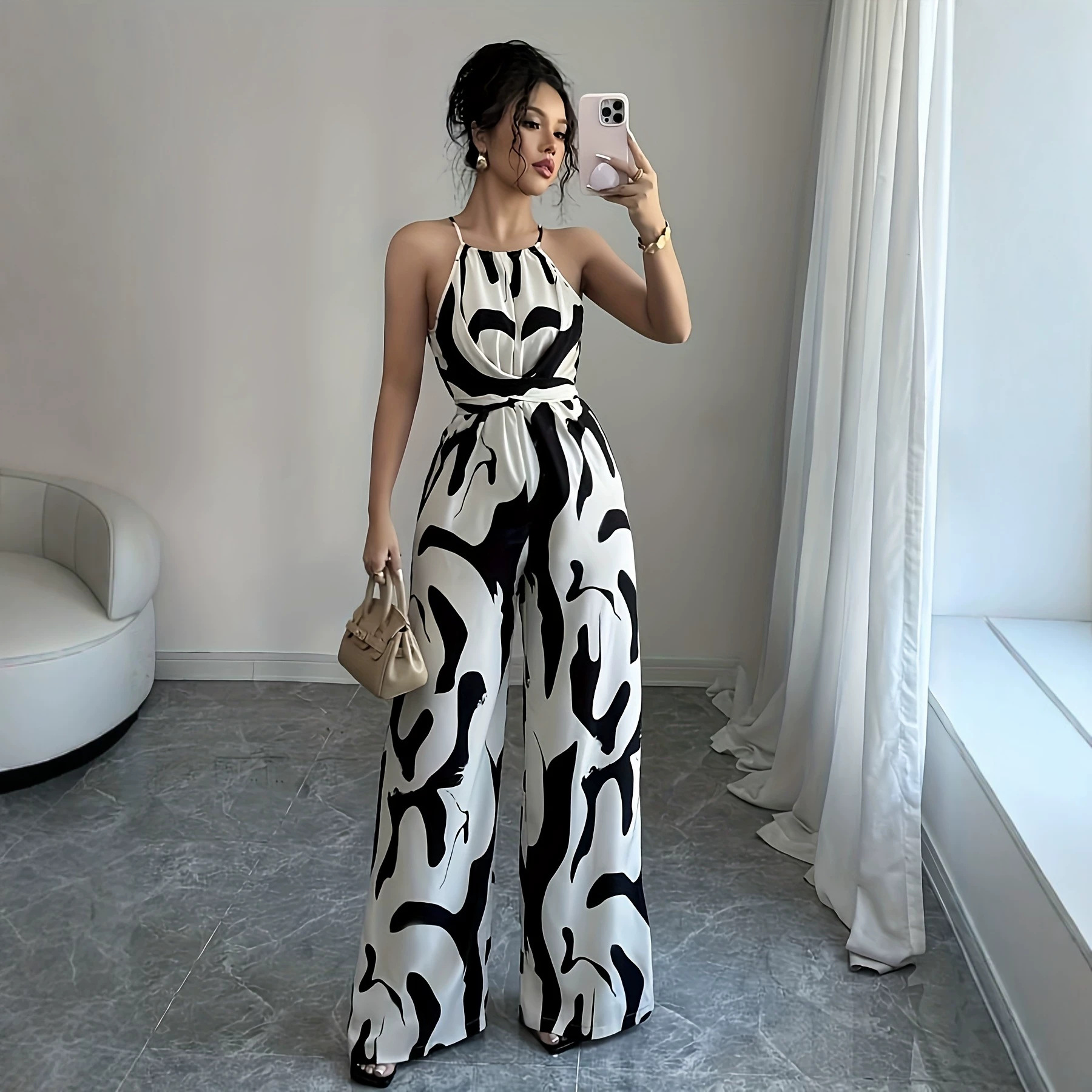 2025女装源头批发收腰显瘦宽松黑白牛奶纹印花挂脖阔腿裤女连体裤
